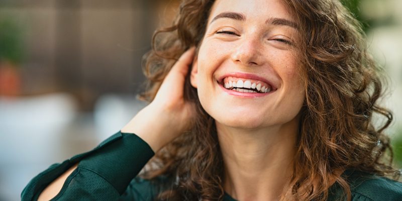Young beautiful woman laughing